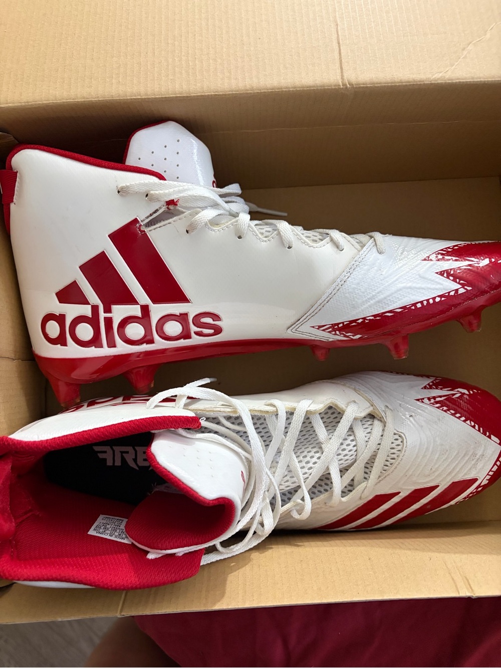 adidas White and Red Men's Athletic Cleats with Bold Logo